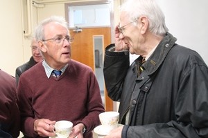 Speaker Ron Elsdon chats to a member of the Retired Clergy Association.