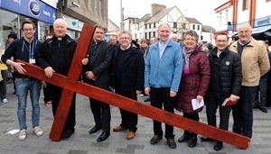 At the cross: Lisburn City Centre Clergy pictured at the cross prior to the annual ‘Good Friday carrying of the cross walk of witness’ in Lisburn.  L to R:  Rev Simon Genoe (Vicar at Lisburn Cathedral), Father Dermot McCaughan (P.P. of St Patrick’s Church, Rev John Brackenridge (First Lisburn Presbyterian Church), Rev Mervyn Ewing (Seymour Street Methodist Church), The Very Rev Canon Sam Wright (Lisburn Cathedral), Evelyn Whyte (Deaconess at First Lisburn Presbyterian Church), Rev Paul Dundas (Christ Church Parish) and George Hilary (Lisburn Christian Fellowship).