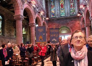 Banners are paraded at the MU Festival Service. Guest speaker, Phyllis Grothier, MU All Ireland President, is in the foreground on the right.
