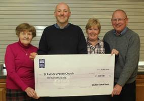 Presenting the proceeds of recent Ballymena Parish student lunches to church funds are volunteers, from left: Joan Holden, the Rev Iain Jamison, Barbara Fleming and Alex McKay.