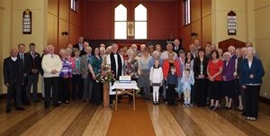 The Rev Ian Magowan celebrates the 40th anniversary of St Patrick’s Church, Antrim, with parishioners.