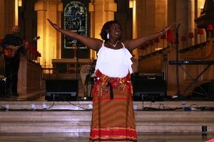 Ugandan drummer Donna Namusake opened the concert in St Anne's Cathedral.