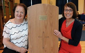 Thelma Campbell and Noreen Kavanagh (Enrolling Member) pictured at a bible trolley which they presented on behalf of the Mothers’ Union to celebrate the 50th Anniversary of St Columba’s Church.