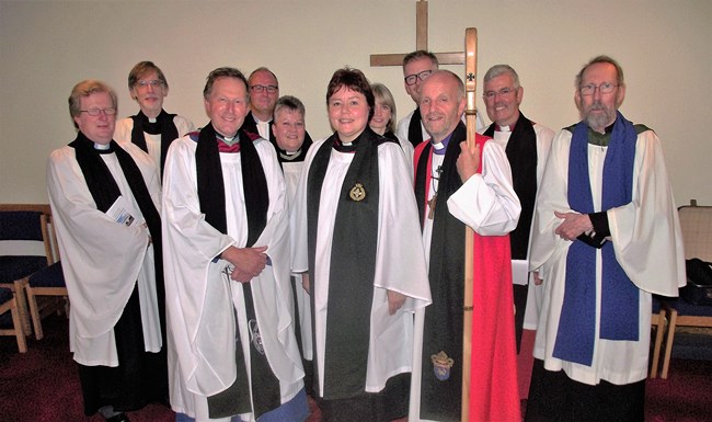 The Rev Lynne Gibson, front centre, with the Bishop of Connor, and clergy who attended her institution in Ballymacash on September 7. Photo: Brian Kelly.