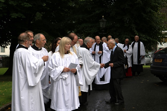 Clergy chat to Ballymena bellringer Sam Letters before they process into St Patrick's for the Service or Ordination.