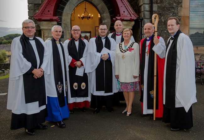 At the institution of the Rev Andrew Campbell in Broughshane are, from left: The Rev David Ferguson, Canon Ronnie Nesbitt, Archdeacon Stephen McBride, the Rev Andrew Campbell, the Rev Dr Alan McCann, Cllr Audrey Wales MBE, Mayor of Ballymena, Bishop Alan Abernethy and the Rev Adrian Halligan. Photo; Ivan Connor.