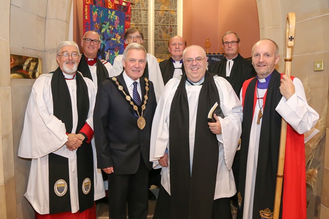 At the service of institution in Lambeg are, back from left: The Ven Dr Stephen McBride, Archdeacon of Conor; The Rev Clifford Skillen, Bishop’s Chaplain, The Rt Rev Ferran Glenfield, Bishop of Kilmore, Elphin and Ardagh, who preached; the Rev Canon William Taggart, Registrar. From, from left: The Rev Canon John Budd, Rural Dean; The Mayor of Lisburn and Castlereagh, Councillor Brian Bloomfield, MBE; The Rev Eddie Coulter and the Bishop of Connor, the Rt Rev Alan Abernethy. Photograph: Norman Briggs.