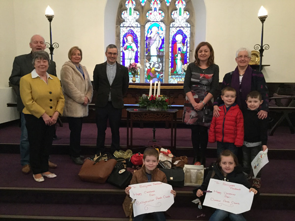 The Rev Trevor Kelly and Mrs Aurelia Kelly with children and parishioners from Duneane and Ballyscullion.