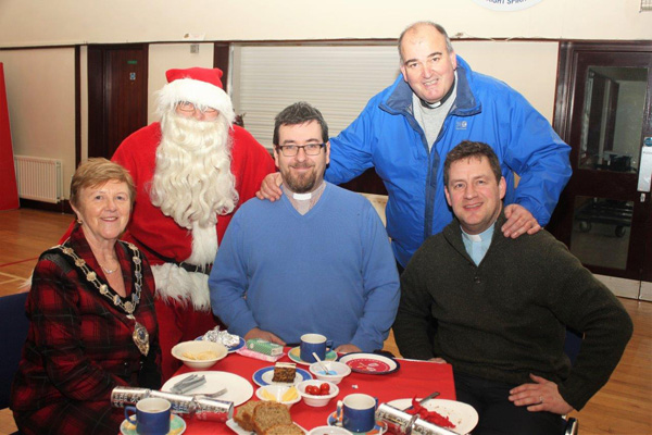 At the Wednesday Club meeting this week are Mayor Audrey Wales MBE; the Rev Mark McConnell (rector); the Rev Dennis Christie (curate). Standing; Santa aka Alex McKay & The Rev John McClure (curate).