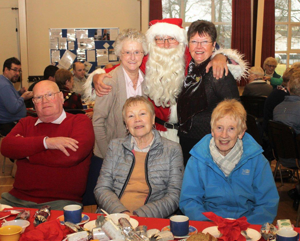 Seated are George Allen, Lizzie Allen, and Isobel Adair and standing are Anne Bacon; Santa & Brenda Nixon.