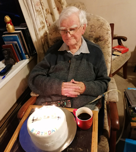 Billy enjoying his 100th birthday cake made by his granddaughter Helen.