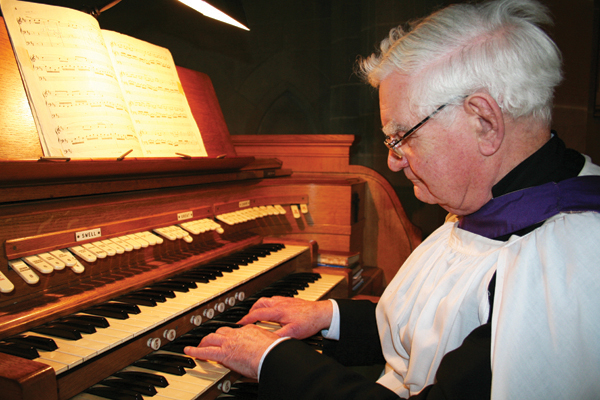 Billy Adair plays the organ in the former Church of St James in Antrim Road, Belfast, back in 2007, shortly before the building closed and St James's united with St Peter's.