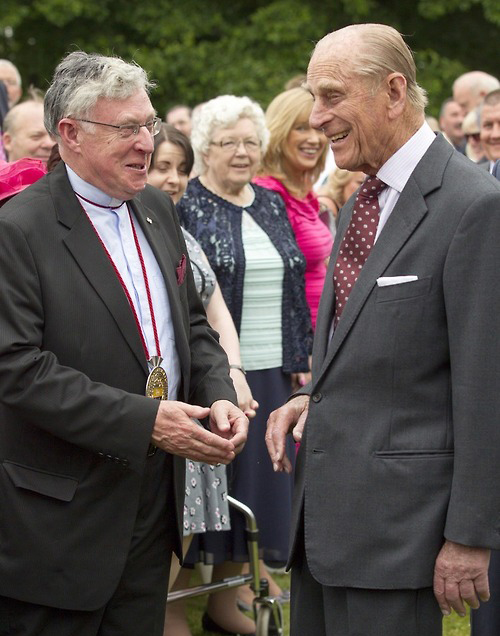 Dean John Bond chats with the Duke of Edinburgh at a Garden Party at Hillsborough Castle in 2014.