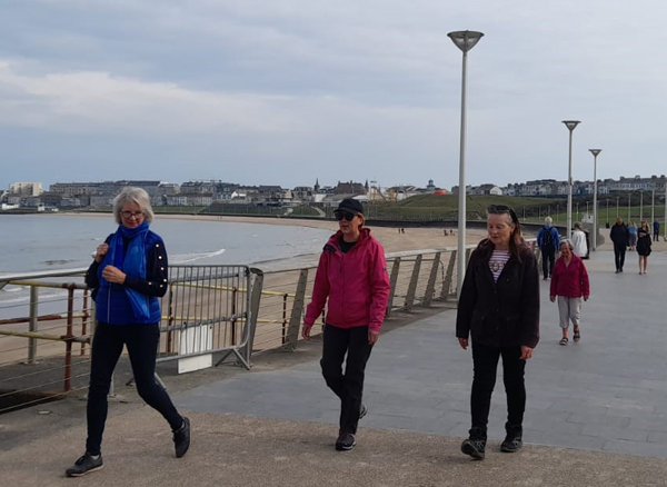 All Ireland President June Butler leads the walkers along West Strand Promenade, Portrush.