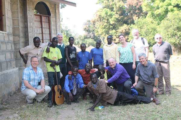 Former Bishop of Connor, the Rt Rev Alan Abernethy, last visited Yei with a Connor team in January 2013, before civil unrest prevented his return. He is pictured with local clergy and people in Mongo village, along with team members the Rev Andrew Sweeney, Dean Sam Wright, Judith Cairns, Dr Frank Dobbs, Dean Stephen Forde and David Gough, formerly of CMSI.