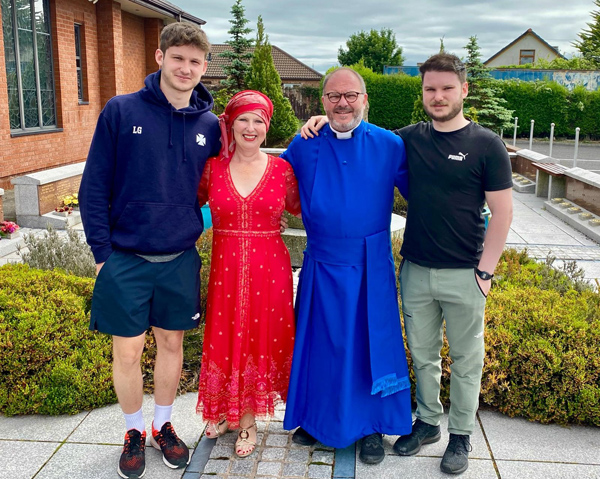 The Rev Canon Kevin Graham and his wife Cheryl with their sons Jamie and Luke after Kevin and Cheryl renewed their wedding vows in St Colman’s, Kilroot, the church in which they were married almost 25 years ago.