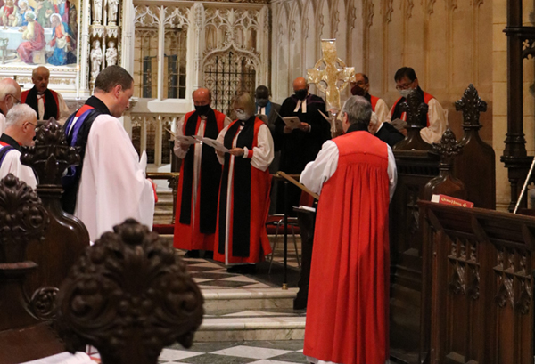 Dean Shane Forster installs Archbishop John McDowell at his throne in St Patrick’s Cathedral, Armagh.