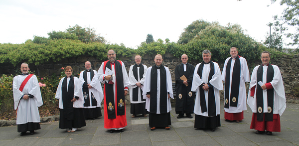 At the Service of Ordination of Priests on September 12 are, from left: The Rev Brendan O’Loan; the Rev Janet Spence; the Rev Canon Kevin Graham, Director of Ordinands; Bishop George Davison; Archdeacon Barry Forde; the Rev Nathan Ervine; the Rev William Taggart, Registrar; the Rev Christopher St John, rector, St Nicholas’; the Rev Canon James Carson, preacher; Archdeacon Paul Dundas.