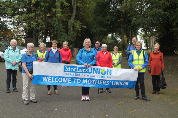 June Butler, centre with her fellow walkers before leaving St Jude's, Muckamore, to walk to All Saints', Antrim.
