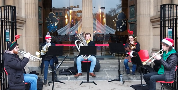 The Brass Quintet of the Ulster Youth Orchestra keeping spirits up on the steps on December 23.