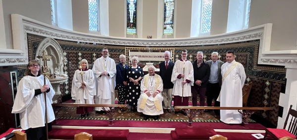 Lord Eames dedicates items in Eglantine Parish