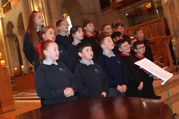 School choirs raise their voices at St Anne Trust Carolfest