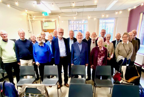 Retired school principal addresses retired clergy meeting
